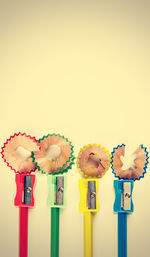 Close-up of cupcakes against white background