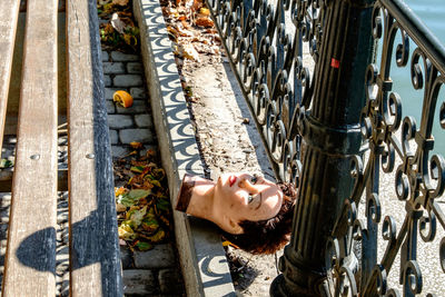 High angle view of woman hand in water