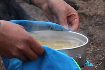 Close-up midsection of man preparing food