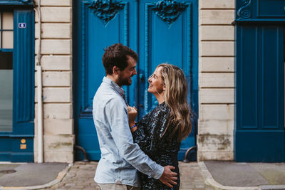 Young couple standing outdoors