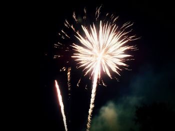 Low angle view of firework display