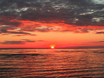 Dramatic sky over sea during sunset