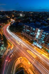 High angle view of light trails on city street