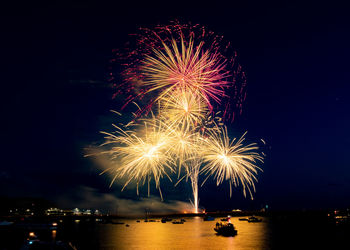 Firework display at night