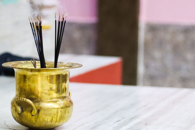 Close-up of cocktail in glass on table