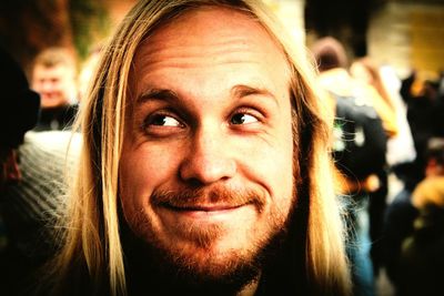 Close-up portrait of smiling mid adult man