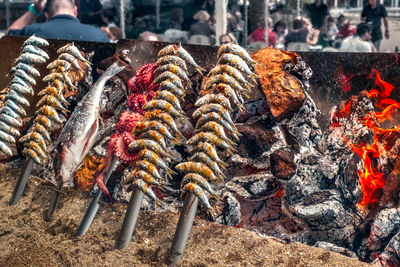 Barbecue with seafood grilled on stick