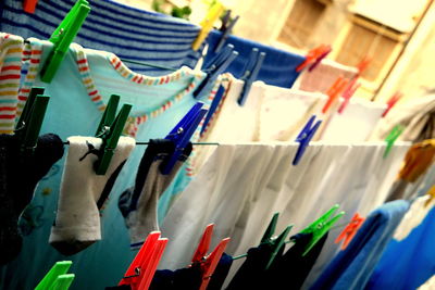 Close-up of clothes hanging on clothesline