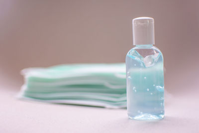 Close-up of water bottle on table