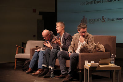 Men sitting on floor