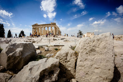 Acropolis of athens against cloudy sky