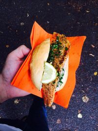 Cropped image of hand holding ice cream