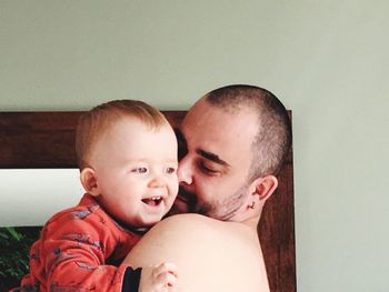 Portrait of happy mother with baby