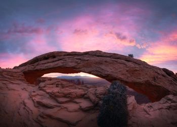Rock formations against sky during sunset