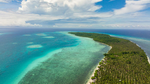 Aerial view of beach against sky