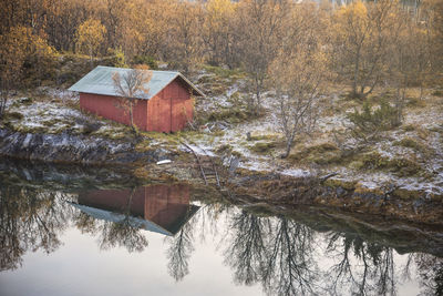 House on wooden port in a norwegian fjord