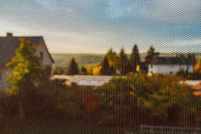 Close-up of fence against sky