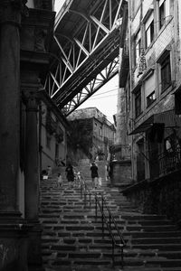 Low angle view of people on steps