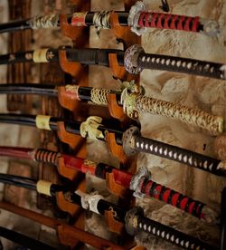 Close-up of wine bottles in shelf