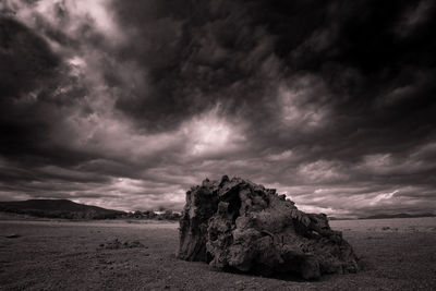 Scenic view of dramatic sky over land
