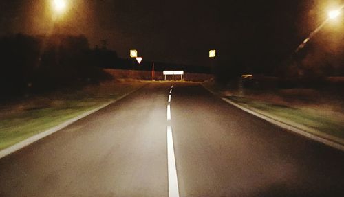 Illuminated street lights at night