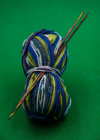 Close-up of thread on blue background