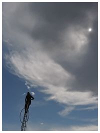 Low angle view of bicycle against sky