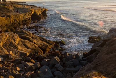 Scenic view of sea against sky at sunset