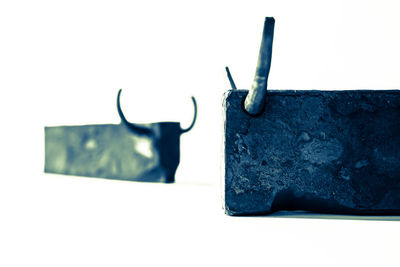 Close-up of clothespins on clothesline