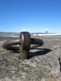 Close-up of metallic object against blurred background