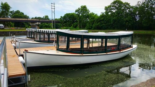 Boats moored in lake against sky at the cushwa basin in williamsport md