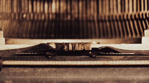 Close-up of old metal on table