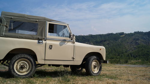Vintage car against sky