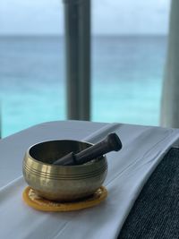 High angle view of mortar and pestle on table