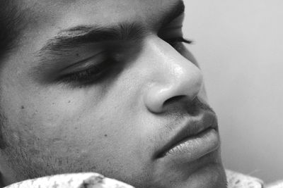 Close-up of thoughtful young man