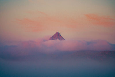 Scenic view of mountains against sky during sunset