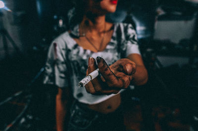 Close-up of man smoking cigarette