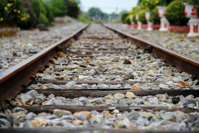 Stones amidst railway tracks