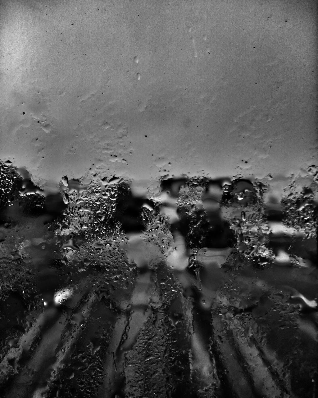 water, darkness, black and white, wet, monochrome, drop, black, rain, monochrome photography, glass, window, transparent, nature, indoors, no people, close-up, full frame, backgrounds, raindrop, rainy season, car, freezing, day, mode of transportation, transportation, reflection, light, motor vehicle