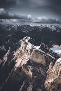 Scenic view of mountains against sky during winter