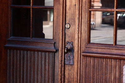 Close-up of closed wooden door of building