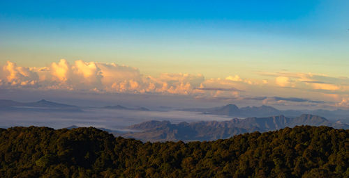 Scenic view of mountains against sky during sunset