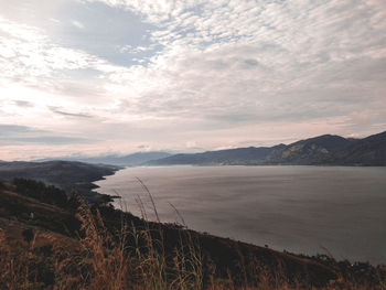 Scenic view of lake against sky