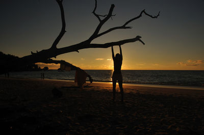 Scenic view of sea at sunset