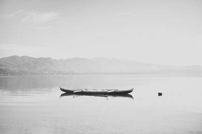 Ship in sea against sky