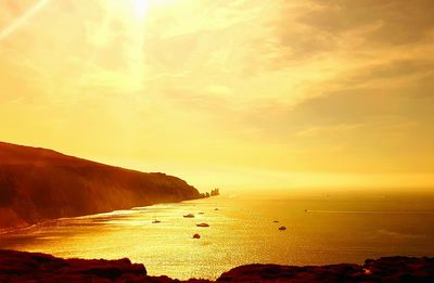 View of beach at sunset