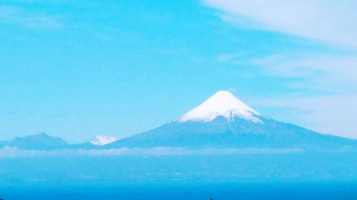 Scenic view of volcanic mountain against sky
