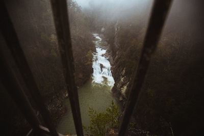 High angle view of stream seen through window