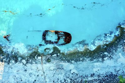 High angle view of abandoned shipwreck on sea