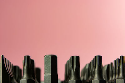 Close-up of pipes against wall